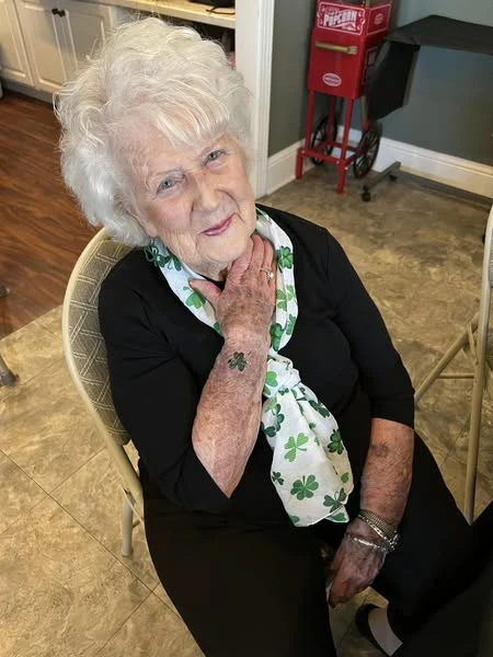 An Orchard Ridge resident showing off her festive St. Patrick's Day attire at their event