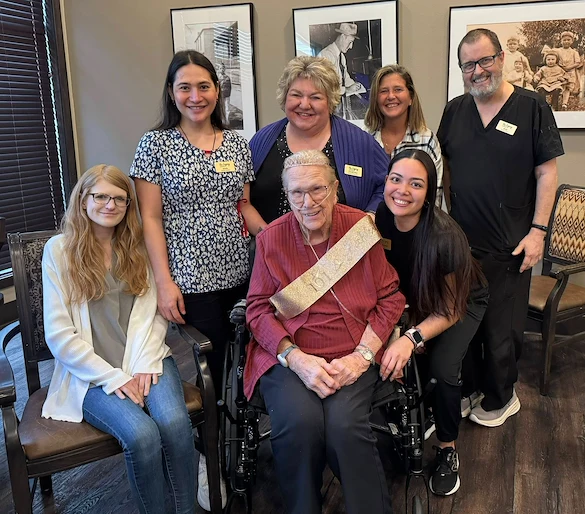 The Legacy of DeForest, WI, smiling resident during birthday celebration