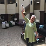 Ascension Living Via Christi Village Georgetown Senior Independent Living in Wichita, Kansas resident holding a bird