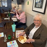 Residents of the Waters of Oak Creek enjoying pie and ice cream on "Pi" day