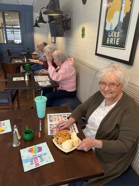 Residents of the Waters of Oak Creek enjoying pie and ice cream on "Pi" day