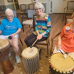 Residents of Verena at Delray embracing their musicality while "Touring through Africa"