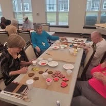 Osprey Heights Gracious Retirement Living Hawthorn Senior Independent Living in Valrico, Florida residents decorating cookies