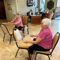 The Peaks At Santa Rita Active Retirement Living Hawthorn Senior Independent Living in Green Valley, Arizona residents playing drums on chairs