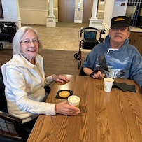 Residents of the Waters at Eden Prairie enjoying the Hot Cocoa Bar event