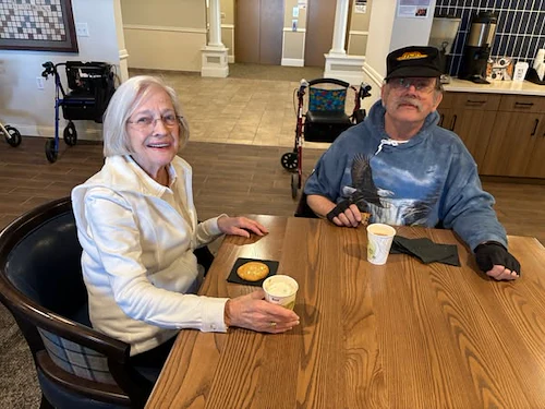 Residents of the Waters at Eden Prairie enjoying the Hot Cocoa Bar event