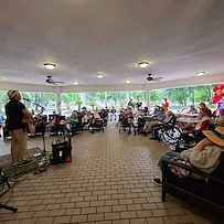 Charter Senior Living of Gainesville, Florida, residents enjoying entertainment