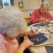 Ascension Living Lakeshore at Siena Memory Care Senior Living in Racine, Wisconsin residents doing arts and crafts