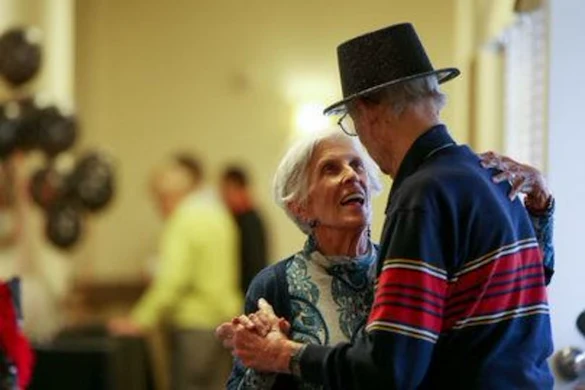 couple dancing at Chelsea Place Memory Care