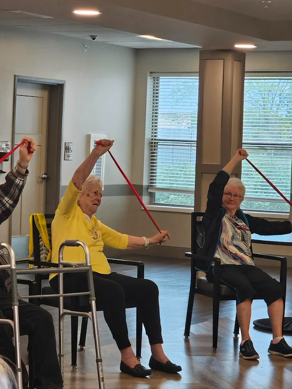 Astral at Auburn, senior living community offering independent living, assisted living, and memory care in Auburn, IN, residents staying active during a exercise class