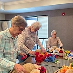 Calumet Trace - a Charter Senior Living Community resident activity - decorating hats