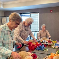 Calumet Trace - a Charter Senior Living Community resident activity - decorating hats
