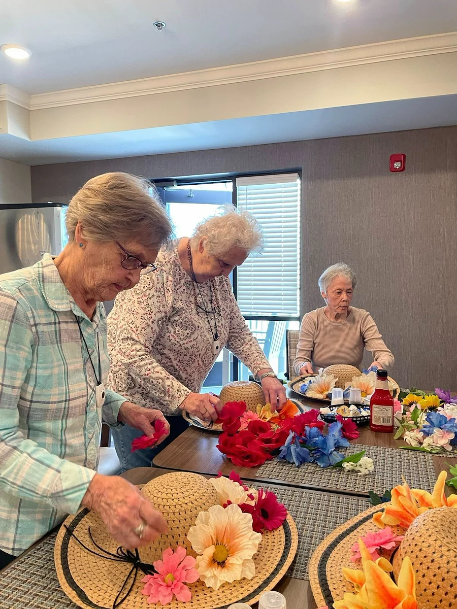 Calumet Trace - a Charter Senior Living Community resident activity - decorating hats