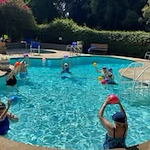 The Oaks of Pasadena residents enjoying the pool.
