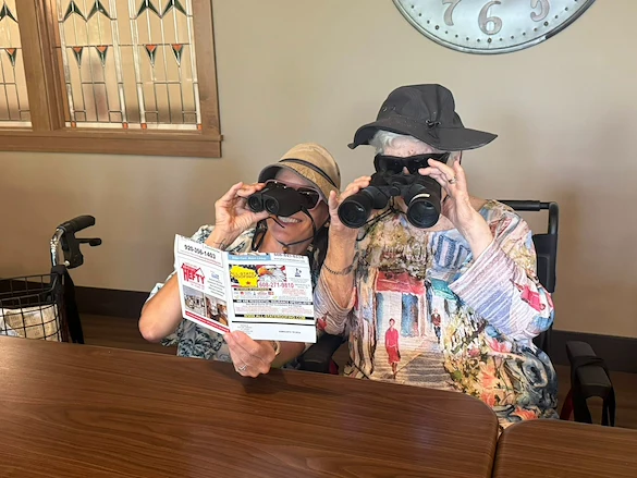 Noel Manor Retirement Living Verona, WI, resident having fun with an exploration activity
