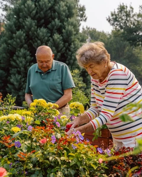 Fieldstone Memory Care of Silverdale residents gardening