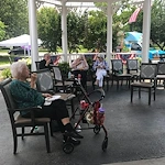 Charter Senior Living of Franklin in Franklin, Tennessee, residents enjoying the outdoors and good company