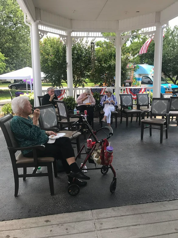 Charter Senior Living of Franklin in Franklin, Tennessee, residents enjoying the outdoors and good company