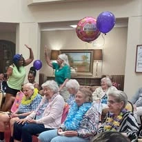 Willow Creek Gracious Retirement Living Hawthorn Senior Independent Living in Chesapeake, Virginia residents at a birthday party