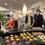 Glenmoore Gracious Retirement Living Hawthorn Senior Independent Living in Happy Valley, Oregon residents browsing food