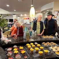 Glenmoore Gracious Retirement Living Hawthorn Senior Independent Living in Happy Valley, Oregon residents browsing food