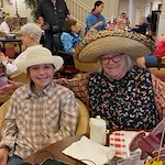 Meadowlark Estates Gracious Retirement Living Hawthorn Senior Independent Living in Lawrence, Kansas resident with family