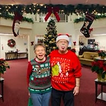 Salmon Creek Gracious Retirement Living Hawthorn Senior Independent Living in Boise, Idaho residents wearing ugly Christmas sweaters