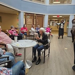 Washington Commons residents stay active by participating in the line dancing classes offered to them