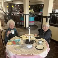 The Rio Grande Gracious Retirement Living Hawthorn Senior Independent Living in Rio Rancho residents at a tea party