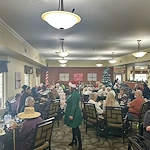 Avamere at Englewood Heights senior living community offering assisted living, memory care, and respite care in Yakima, WA, residents enjoying a community Christmas party