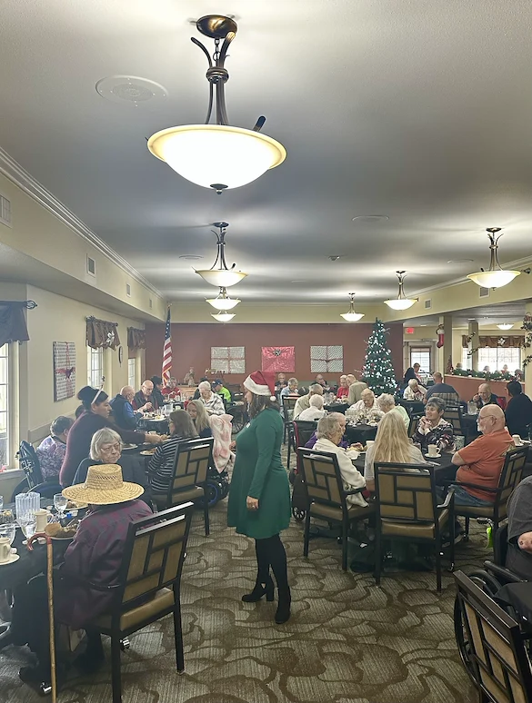 Avamere at Englewood Heights senior living community offering assisted living, memory care, and respite care in Yakima, WA, residents enjoying a community Christmas party