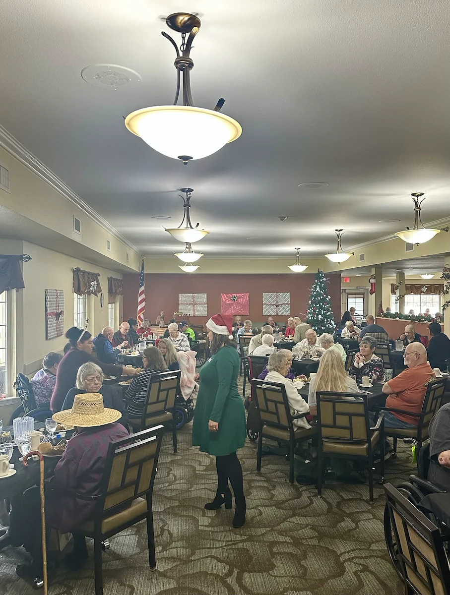 Avamere at Englewood Heights senior living community offering assisted living, memory care, and respite care in Yakima, WA, residents enjoying a community Christmas party
