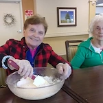 Porter Place Assisted Senior Living Memory Care in Tinley Park, IL residents baking