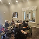 A few of Pinnacle Grove's Senior Living residents learning ASL for the first time