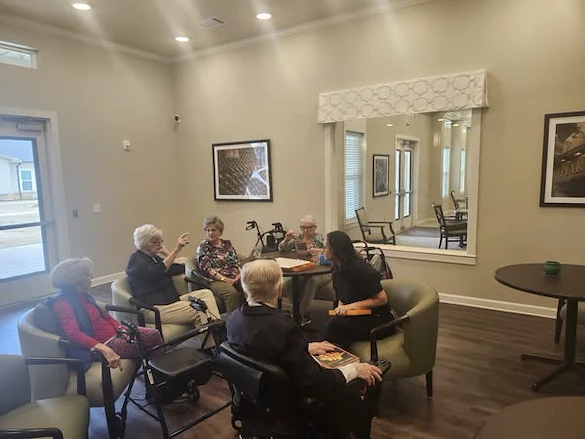 A few of Pinnacle Grove's Senior Living residents learning ASL for the first time