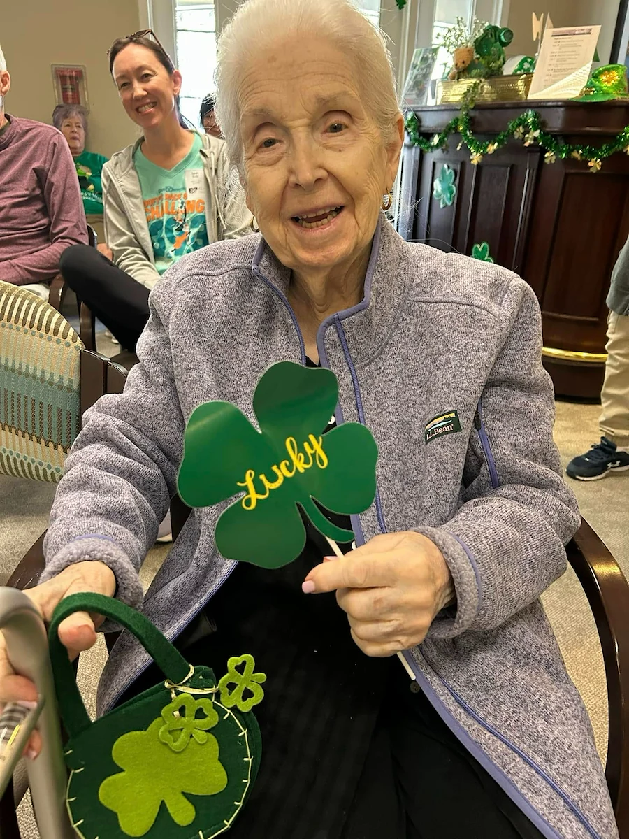 Charter Senior Living of Columbia resident smiling during holiday celebration