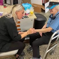 Parker Place Gracious Retirement Living Hawthorn Senior Independent Living in Mentor, Ohio resident getting a manicure