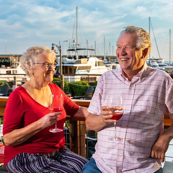 Judson Park Senior Living in Des Moines, WA, residents enjoying a glass of wine