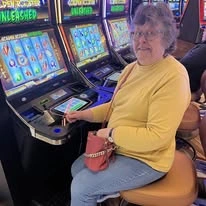 Cascadia Village Senior Living by Cogir in Sandy, Oregon resident at the slot machine at the casino