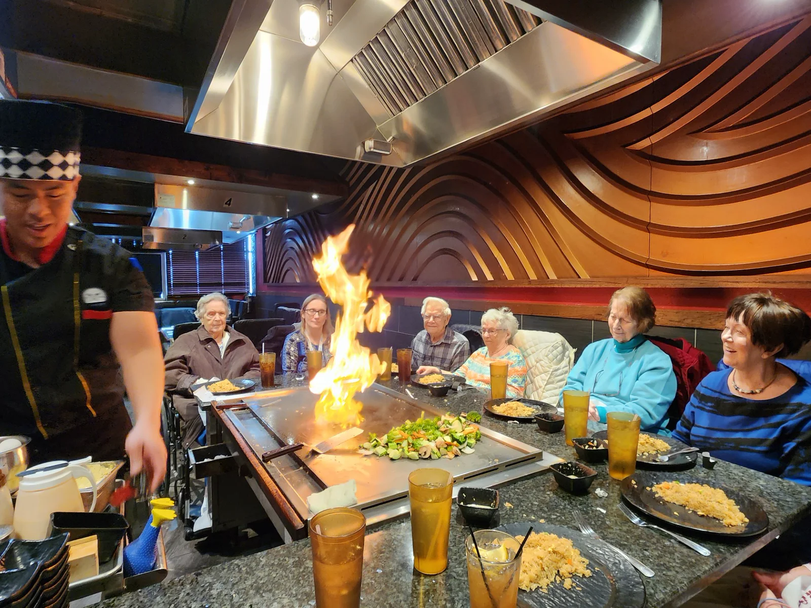 Allisonville Meadows Assisted Living offering assisted living, memory care, and respite care in Fishers, IN, resident outing for a Hibachi dinner