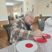 Ascension Living Via Christi Village Ponca City Senior Living in Ponca City, Oklahoma resident painting