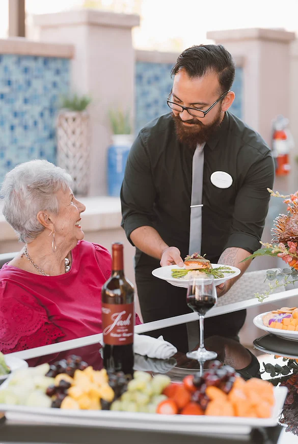 Friendly Server delivering dinner