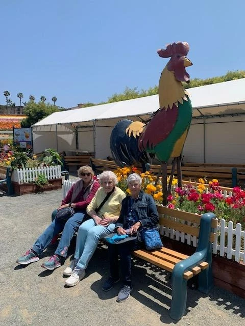 Covenant Living at Mount Miguel in Spring Valley, CA, residents smiling during an outing