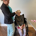 Spring Village at Hammonton happy resident getting her hair done