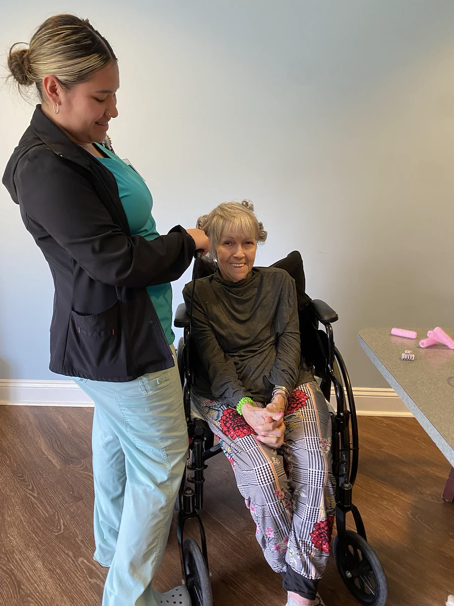 Spring Village at Hammonton happy resident getting her hair done