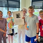 Sage Independence resident interacting with kids in the community