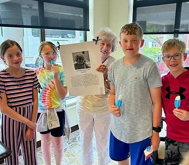 Sage Independence resident interacting with kids in the community