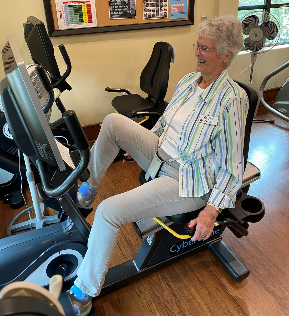 Covenant Living at the Samarkand in Santa Barbara, CA, resident utilizing the equipment in the community fitness room