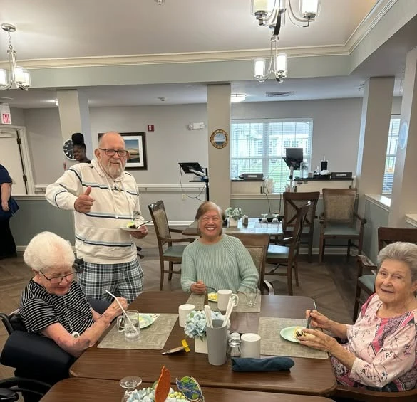 Bennett Place in New Albany, IN, residents enjoying a treat during a birthday celebration