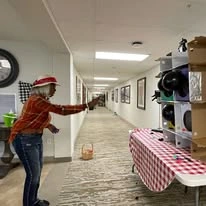 Summit Glen Gracious Retirement Living Hawthorn Senior independent Living in Colorado Springs, Colorado resident playing a game